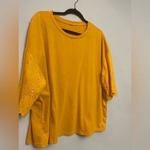 Plus size top with elegant details, perfect for a business or casual o assign.